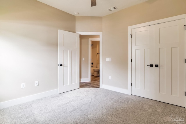 6115 Carroll Rd, Milton, FL 32583 - unfurnished bedroom featuring carpet flooring, baseboards, a closet, and ceiling fan