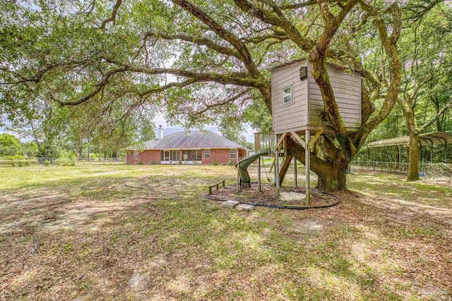 view of yard featuring a carport