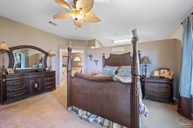 bedroom featuring light carpet and ceiling fan