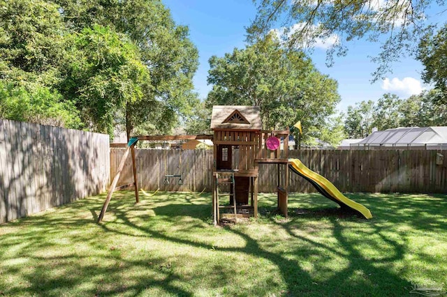 view of jungle gym featuring a yard