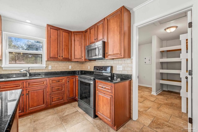 kitchen with brown cabinets, decorative backsplash, stainless steel appliances, and a sink