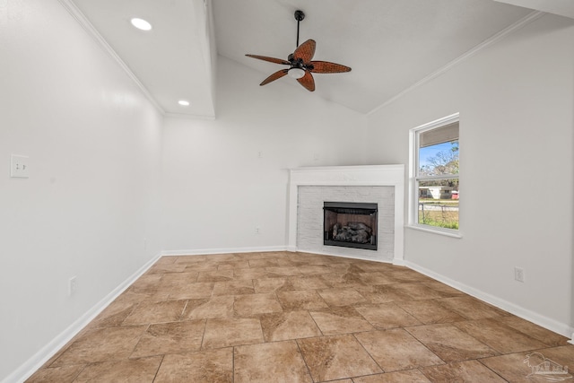 unfurnished living room featuring crown molding, a fireplace, vaulted ceiling, ceiling fan, and baseboards