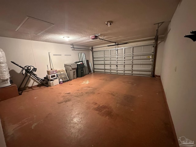 garage featuring a garage door opener