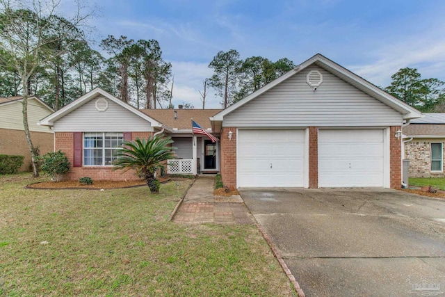 single story home featuring a garage, a front yard, concrete driveway, and brick siding