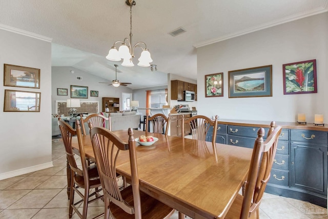 dining space featuring lofted ceiling, visible vents, crown molding, and light tile patterned flooring