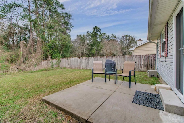 view of patio featuring a fenced backyard