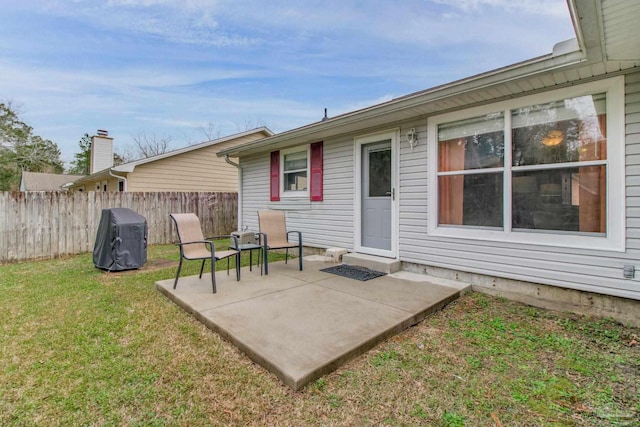 view of patio / terrace featuring fence