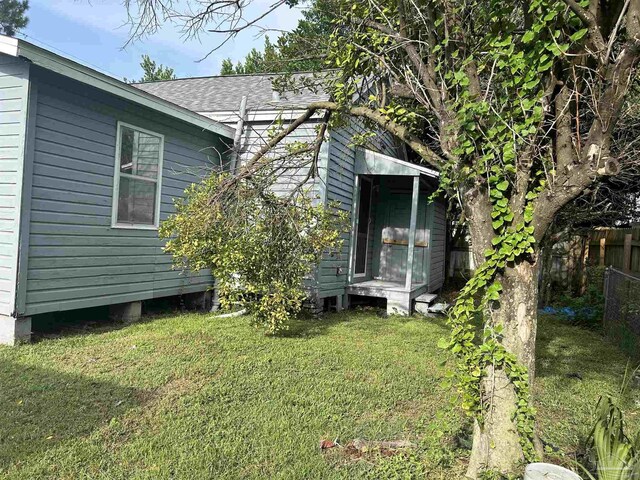 view of property exterior featuring a yard