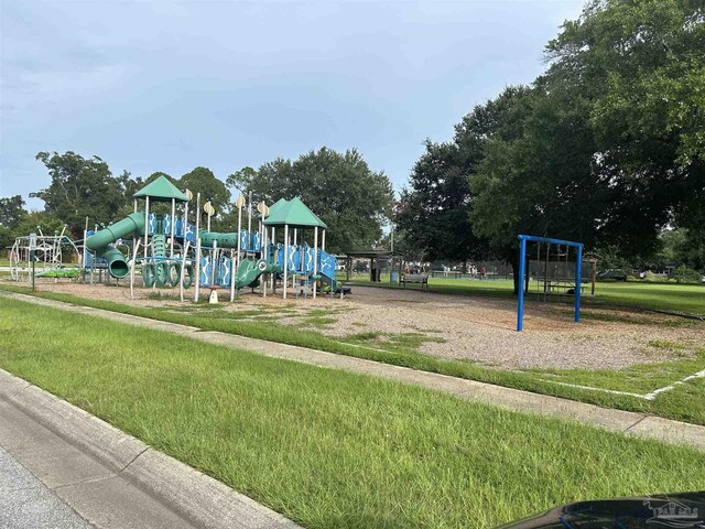 view of playground with a yard