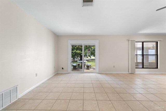 3332 Laurel Dr, Gulf Breeze, FL 32563 - spare room with light tile patterned floors and baseboards
