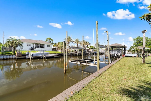 3332 Laurel Dr, Gulf Breeze, FL 32563 - dock with boat lift, a water view, a lawn, and a residential view