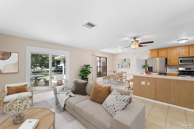 3332 Laurel Dr, Gulf Breeze, FL 32563 - living area featuring light tile patterned floors and a ceiling fan