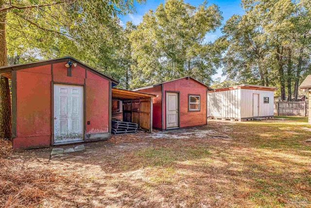 view of outdoor structure with a carport