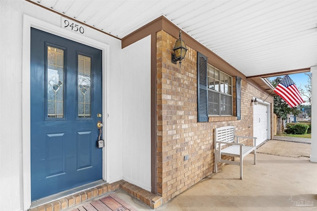 entrance to property featuring a garage