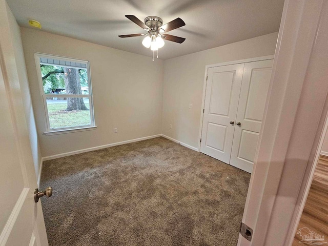 unfurnished bedroom with carpet and ceiling fan