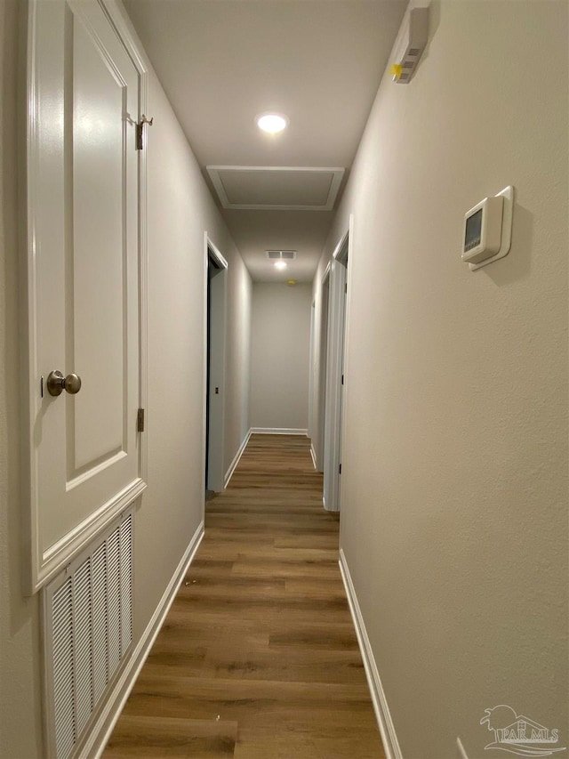 hall featuring dark hardwood / wood-style floors