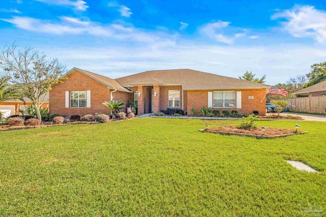 ranch-style house with a front lawn