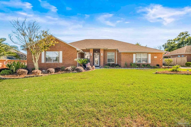 single story home featuring a front yard