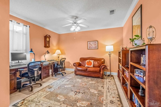 office area with ceiling fan, light tile patterned floors, a textured ceiling, and ornamental molding