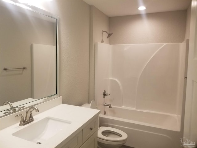 full bathroom featuring shower / tub combination, vanity, and toilet