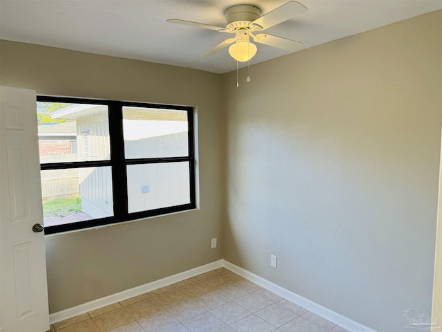 empty room featuring ceiling fan