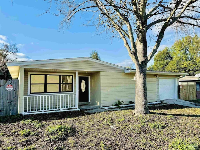 ranch-style house featuring a garage