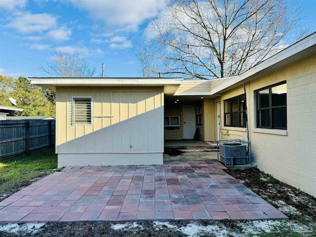 exterior space with a patio and central AC