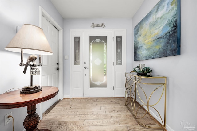 foyer with light hardwood / wood-style floors