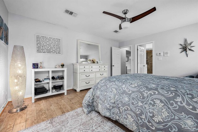 bedroom featuring ceiling fan and light hardwood / wood-style floors