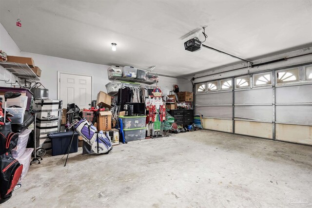 garage featuring a garage door opener