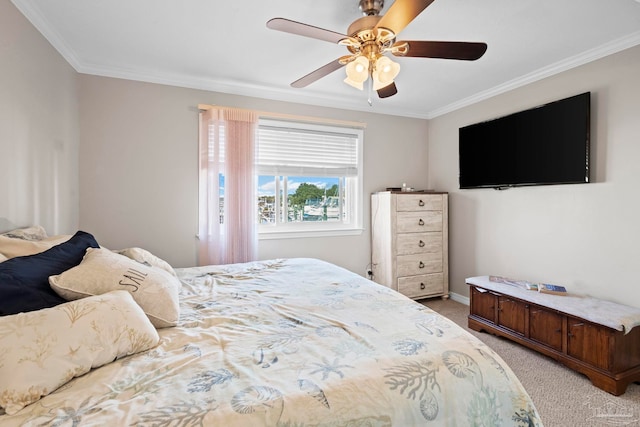 bedroom featuring light carpet, crown molding, and ceiling fan