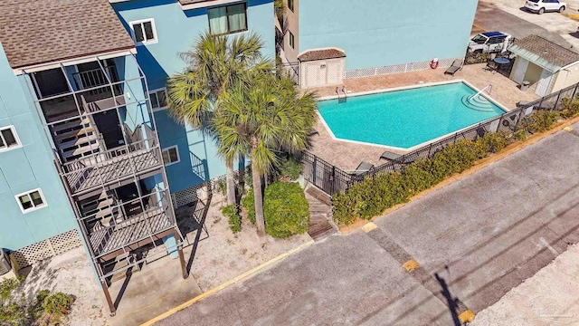 view of swimming pool featuring a patio area