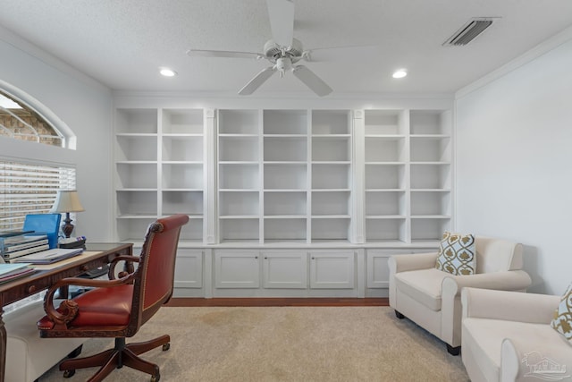 2215 Seascale Ct, Navarre, FL 32566 - office area featuring built in shelves, ceiling fan, ornamental molding, recessed lighting, and light carpet