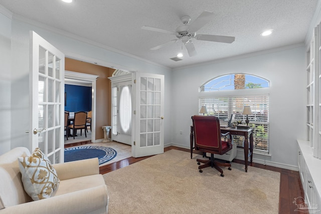2215 Seascale Ct, Navarre, FL 32566 - office area featuring french doors, wood finished floors, ornamental molding, baseboards, and ceiling fan
