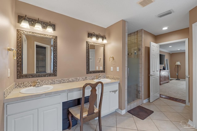 2215 Seascale Ct, Navarre, FL 32566 - full bathroom with a shower stall, double vanity, tile patterned floors, baseboards, and recessed lighting