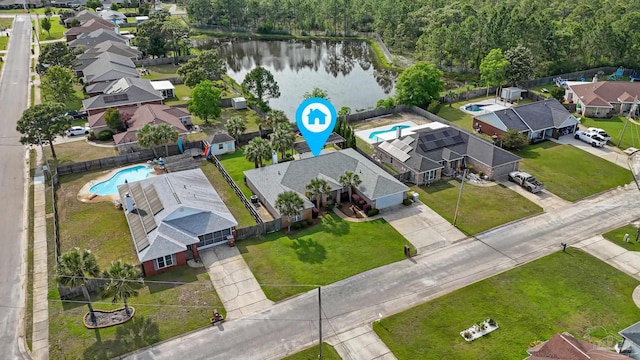 2215 Seascale Ct, Navarre, FL 32566 - aerial perspective of suburban area featuring a pool area and a large body of water