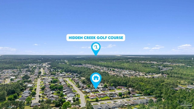 2215 Seascale Ct, Navarre, FL 32566 - aerial overview of property's location featuring nearby suburban area and a heavily wooded area