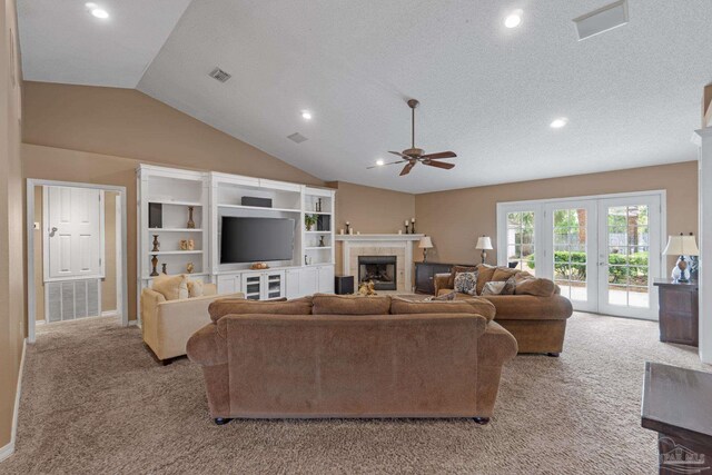 2215 Seascale Ct, Navarre, FL 32566 - living room featuring a ceiling fan, carpet floors, recessed lighting, a fireplace, and vaulted ceiling