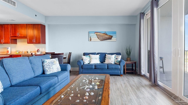 living room featuring light hardwood / wood-style flooring