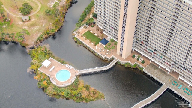 birds eye view of property featuring a water view