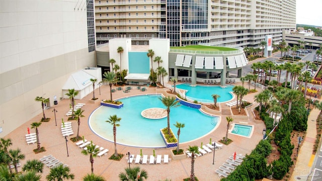 view of swimming pool with a patio area