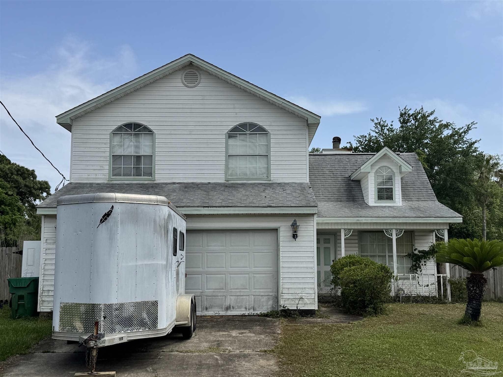 view of front of house featuring covered porch, driveway, a garage, a front lawn, and a shingled roof