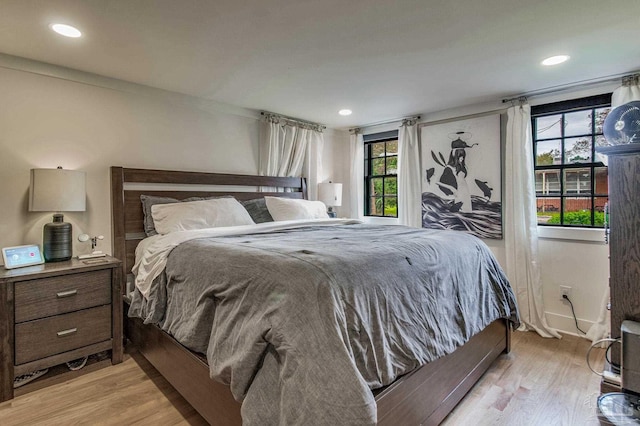 bedroom with light wood-type flooring