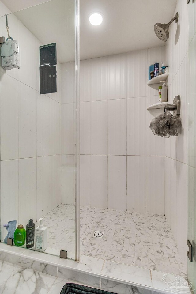 bathroom featuring walk in shower