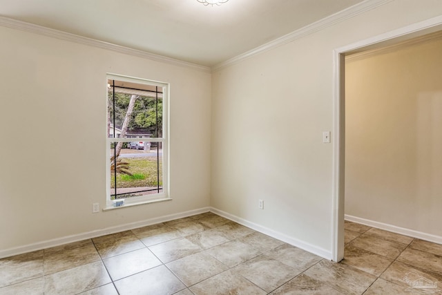 tiled spare room with ornamental molding