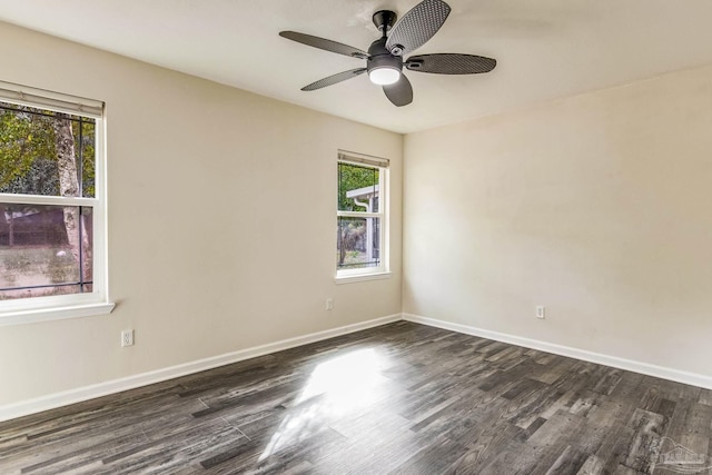 unfurnished room featuring ceiling fan and dark hardwood / wood-style flooring