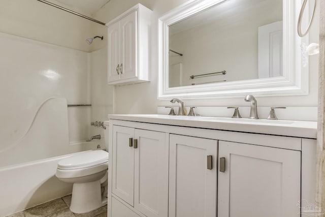 full bathroom with tile patterned flooring, bathing tub / shower combination, vanity, and toilet