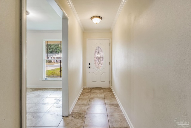 entryway featuring light tile patterned flooring and ornamental molding