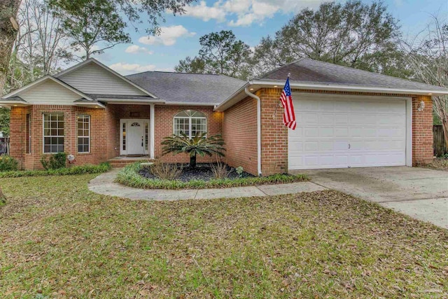 ranch-style home with a garage and a front lawn