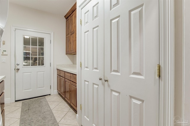 interior space featuring light tile patterned floors